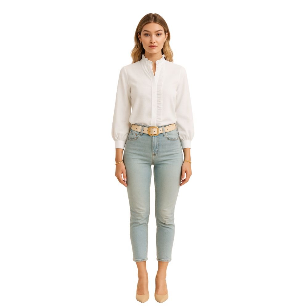 Model wearing the Kouvr women's white textured blouse with ruffle collar, paired with light wash jeans