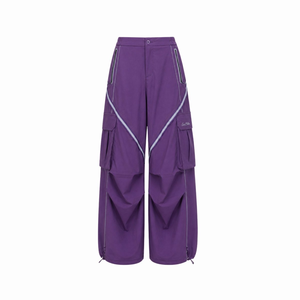 Studio product shot of Kouvr purple wide leg parachute pants emphasizing the geometric white piping, cargo pockets, and lightweight nylon texture against a white background.