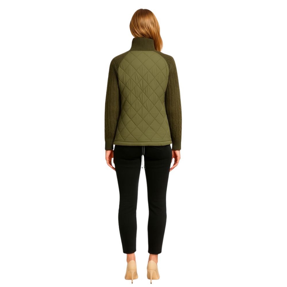 Woman wearing the Kouvr Army Green Quilted Hybrid Jacket with Merino Wool Knit Sleeves