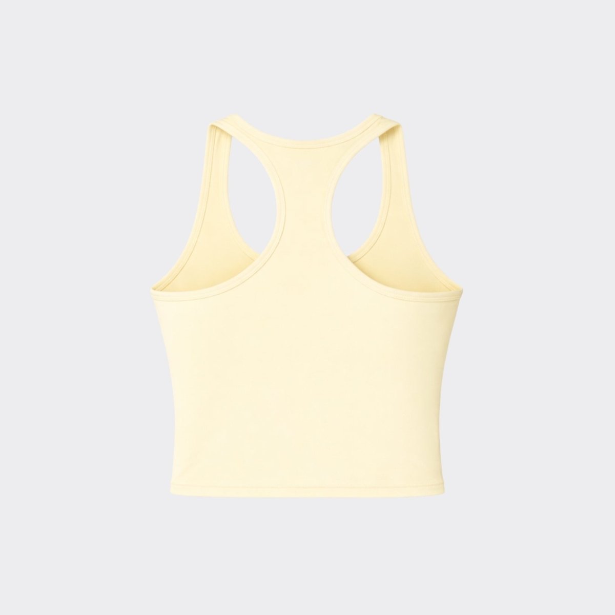 Flat lay back view of Kouvr premium yellow racerback workout tank top