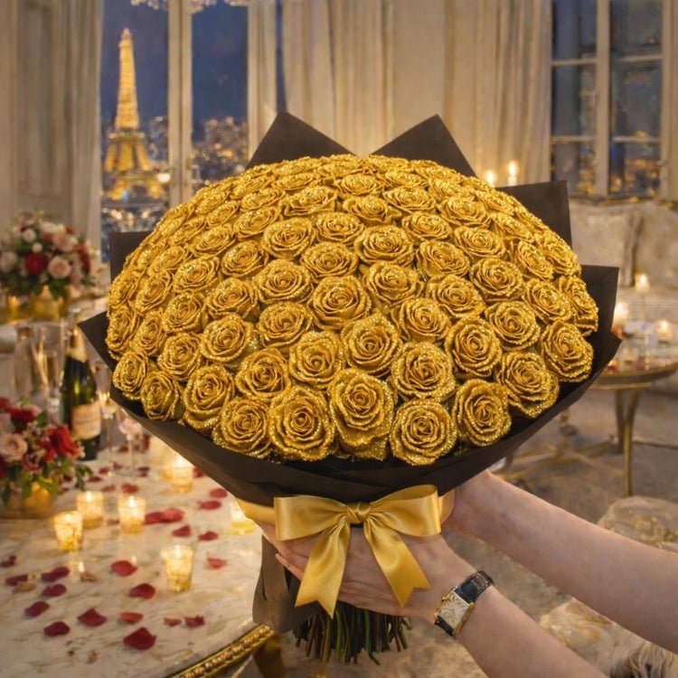 A massive bouquet of handmade gold sparkle roses held in a luxury room with the Eiffel Tower visible outside the window.