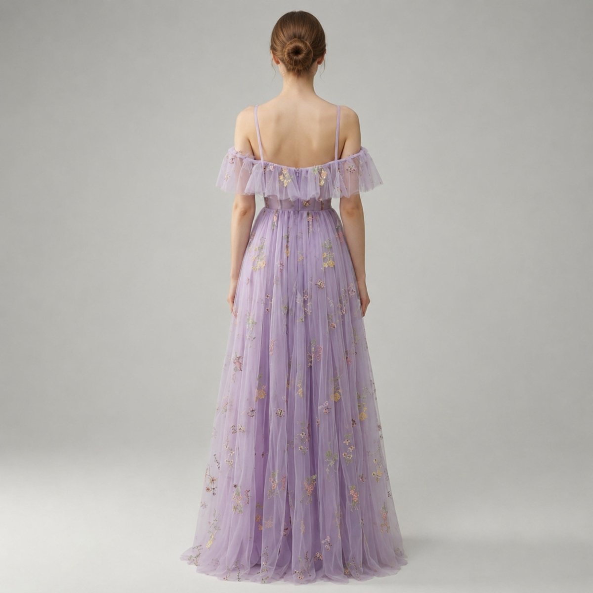 Back view of the Kouvr lilac ethereal fairycore evening gown showing the elegant hidden zipper and flowing sheer tulle skirt.