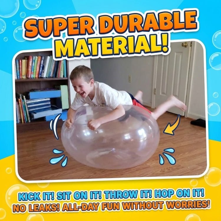 A young boy lying on top of a giant clear bubble ball indoors, demonstrating the super durable, pop-resistant material.