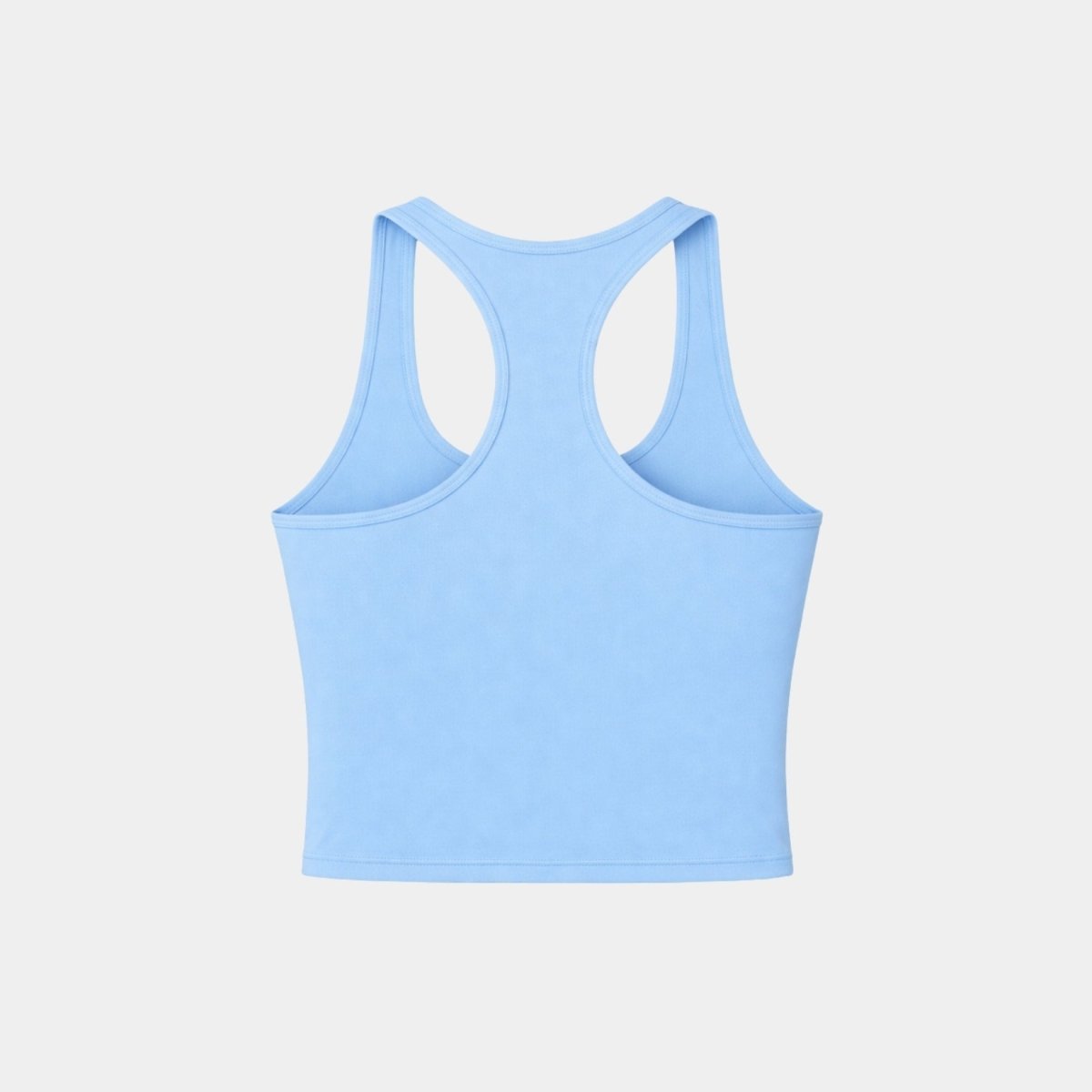 Flat lay back view of light blue racerback sports bra showing racerback cut