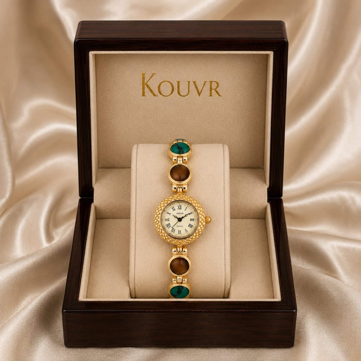 Close up floating angle of a luxury women's quartz watch showing the intricate gold lattice pattern on the case and the Kouvr brand logo on the cream dial.