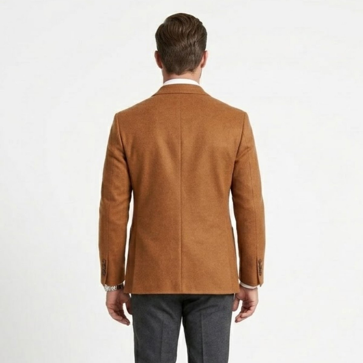 Back view of Kouvr mens camel blazer showing double vent and tailored fit