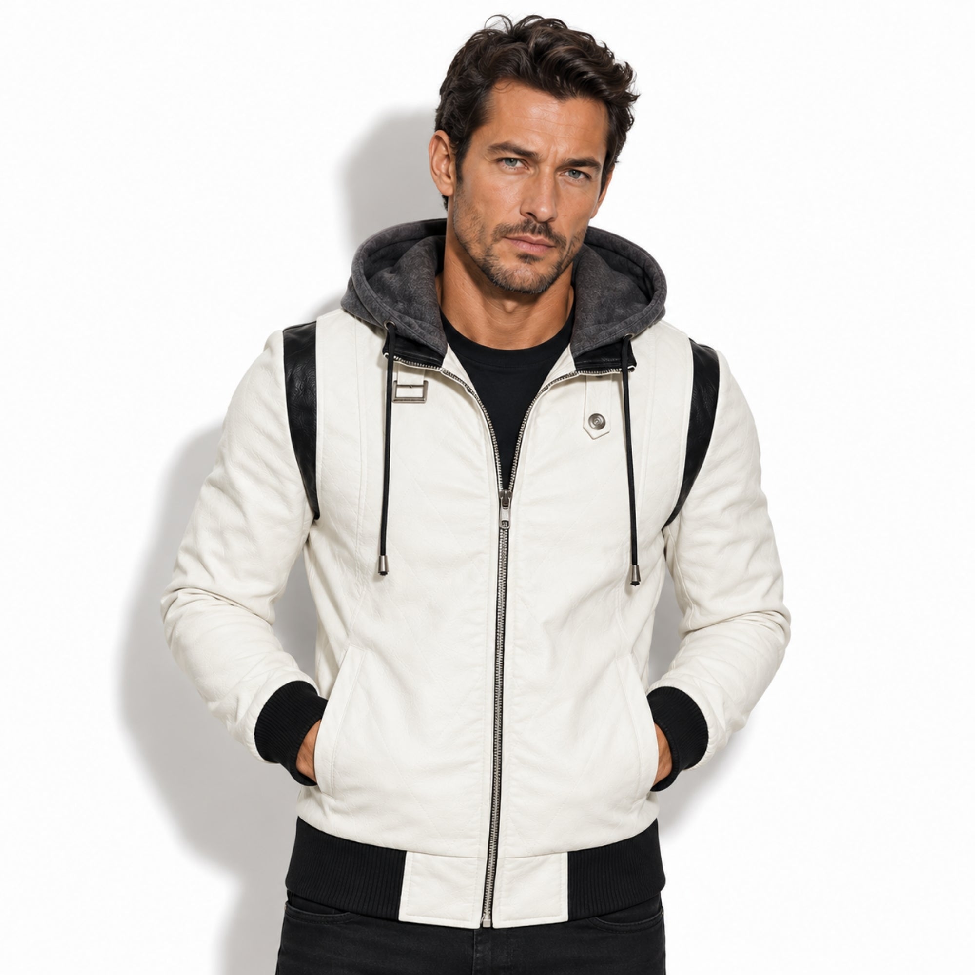 Front view of a male model wearing the Kouvr white leather bomber jacket with contrasting black stripes and grey hood.
