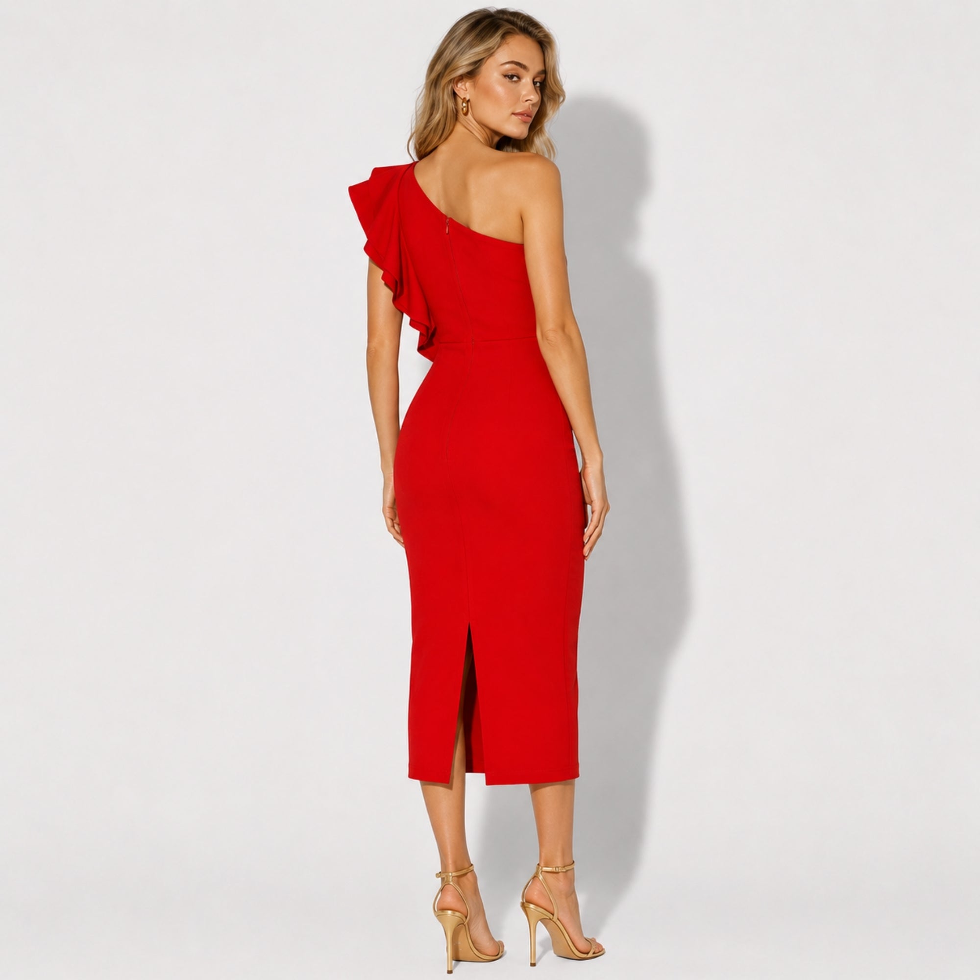 Back view of elegant red evening midi dress showcasing a tailored fit and sophisticated center back split.