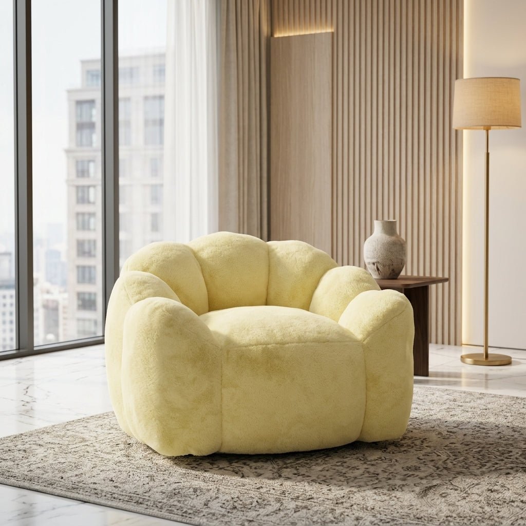  Butter yellow oversized fluted swivel lounge chair in a modern luxury apartment living room setting.