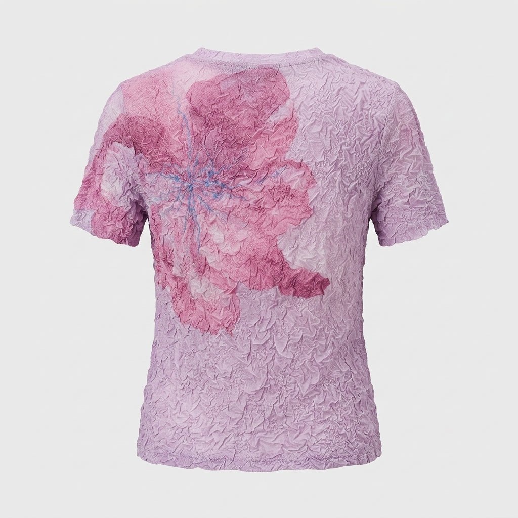 Flat lay studio shot showing back design of Kouvr pink floral textured stretch top