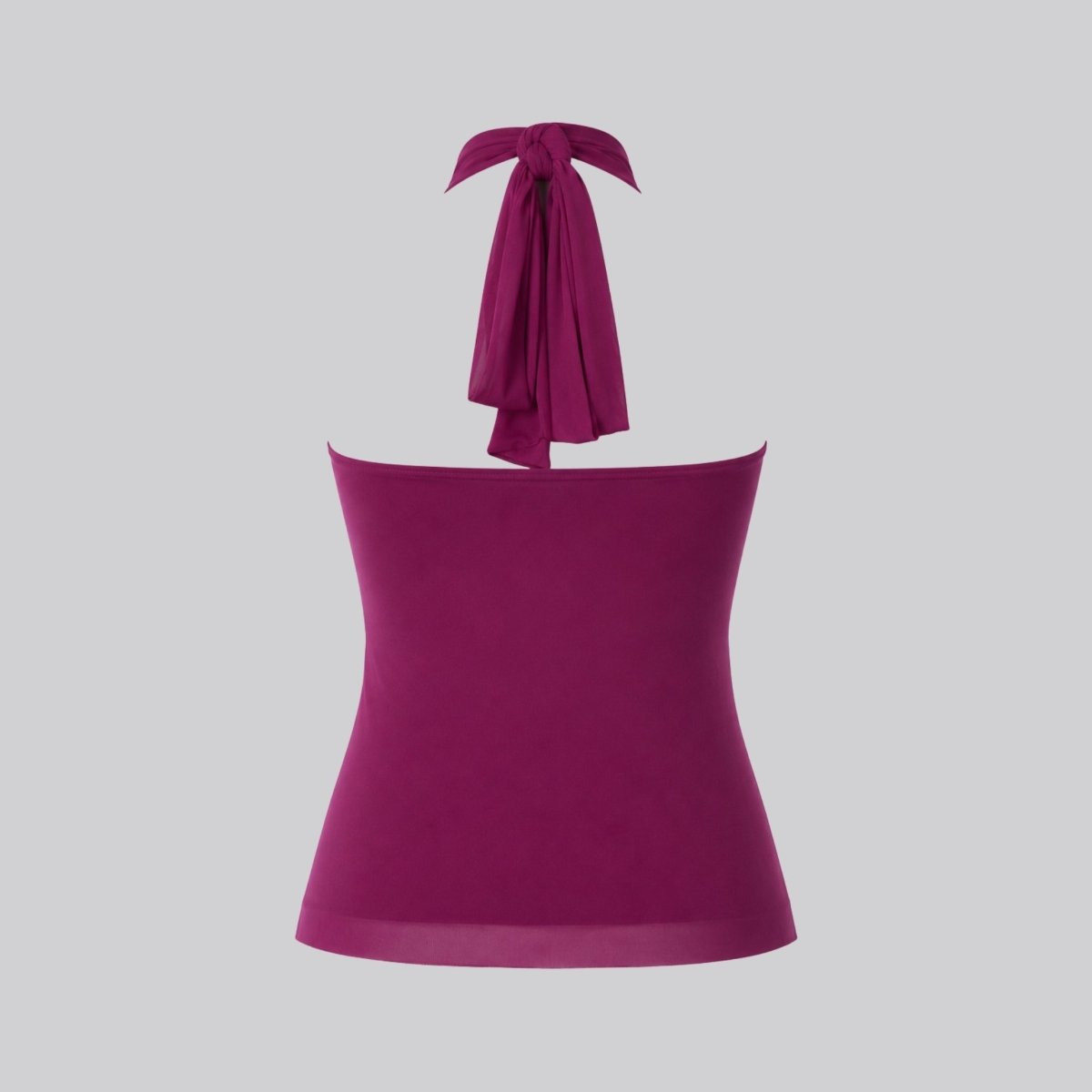  Product back view shot of magenta tie-neck halter top showing opaque back panel and fabric sash.