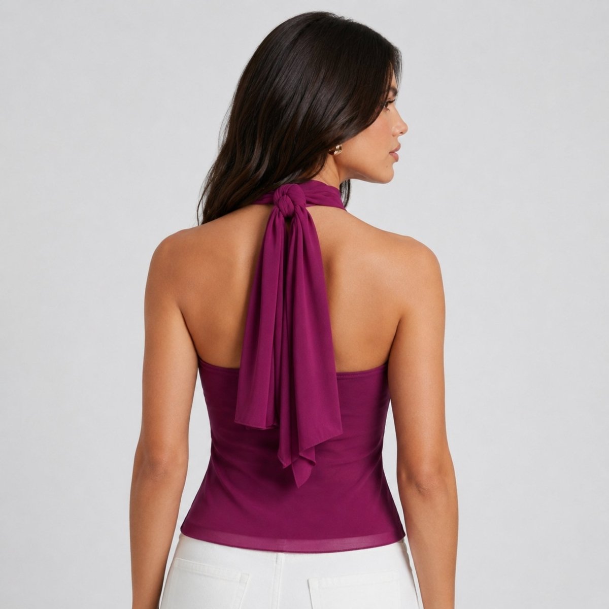 Back view of Kouvr deep purple sleeveless halter blouse showing thick tie-back neck detail.