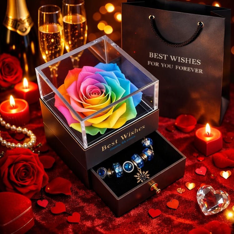 Rainbow eternal preserved rose in a glass display box with a blue charm bracelet drawer.