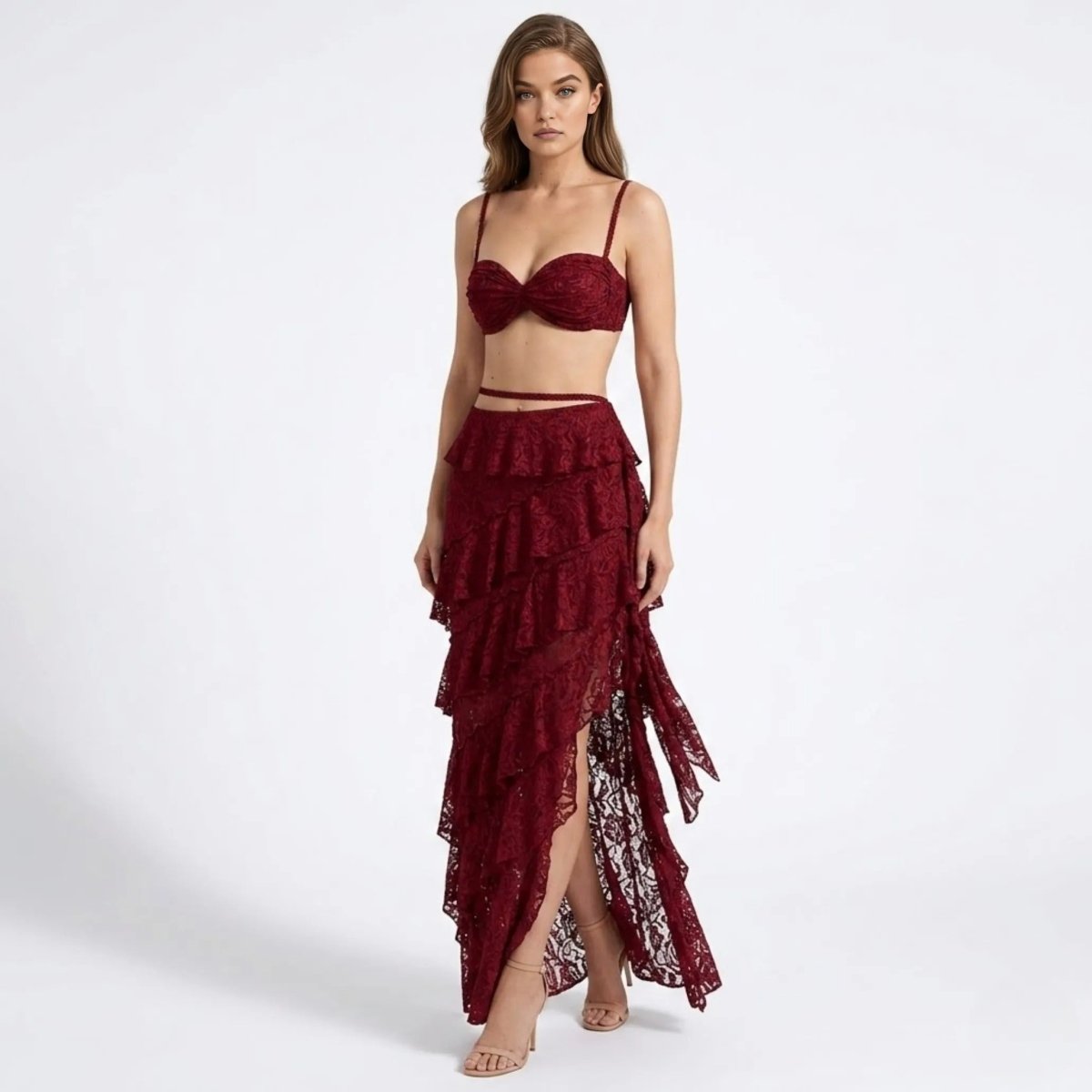 Front view of an affordable luxury wine red lace matching co-ord set with ruched top and high-waisted high-low skirt.