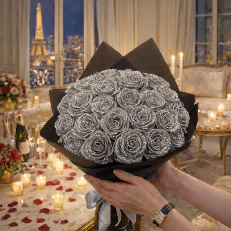 A woman holding a handmade bouquet of silver glitter roses tied with a silver ribbon. Perfect for silver anniversaries or modern gifts.