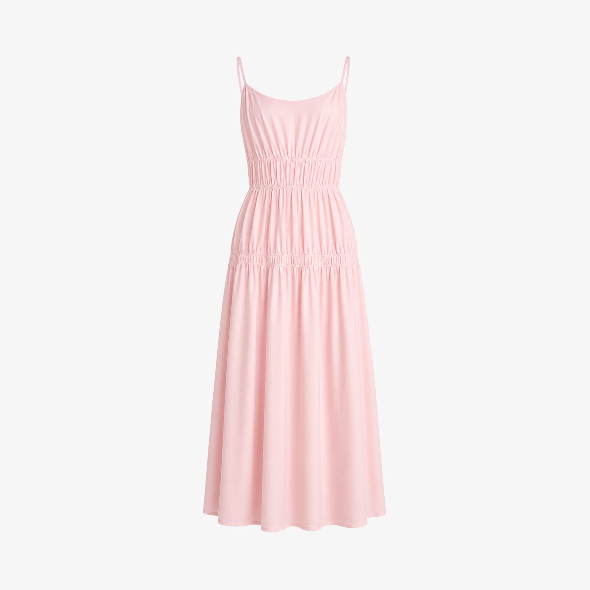 Flat lay front view of light pink smocked waist luxury resort dress