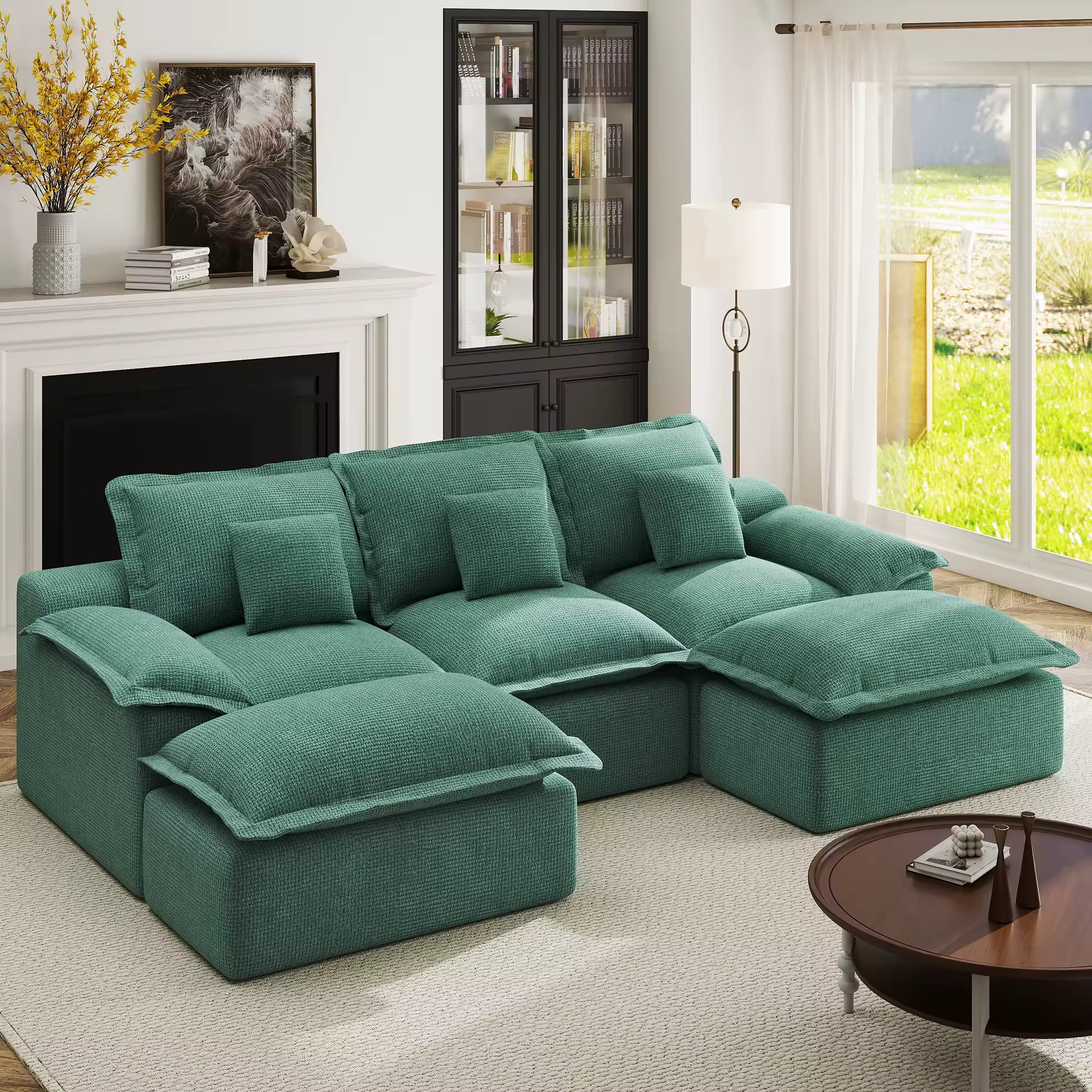 Side profile of a teal modular sofa showing the thick back cushions and overstuffed seat texture.