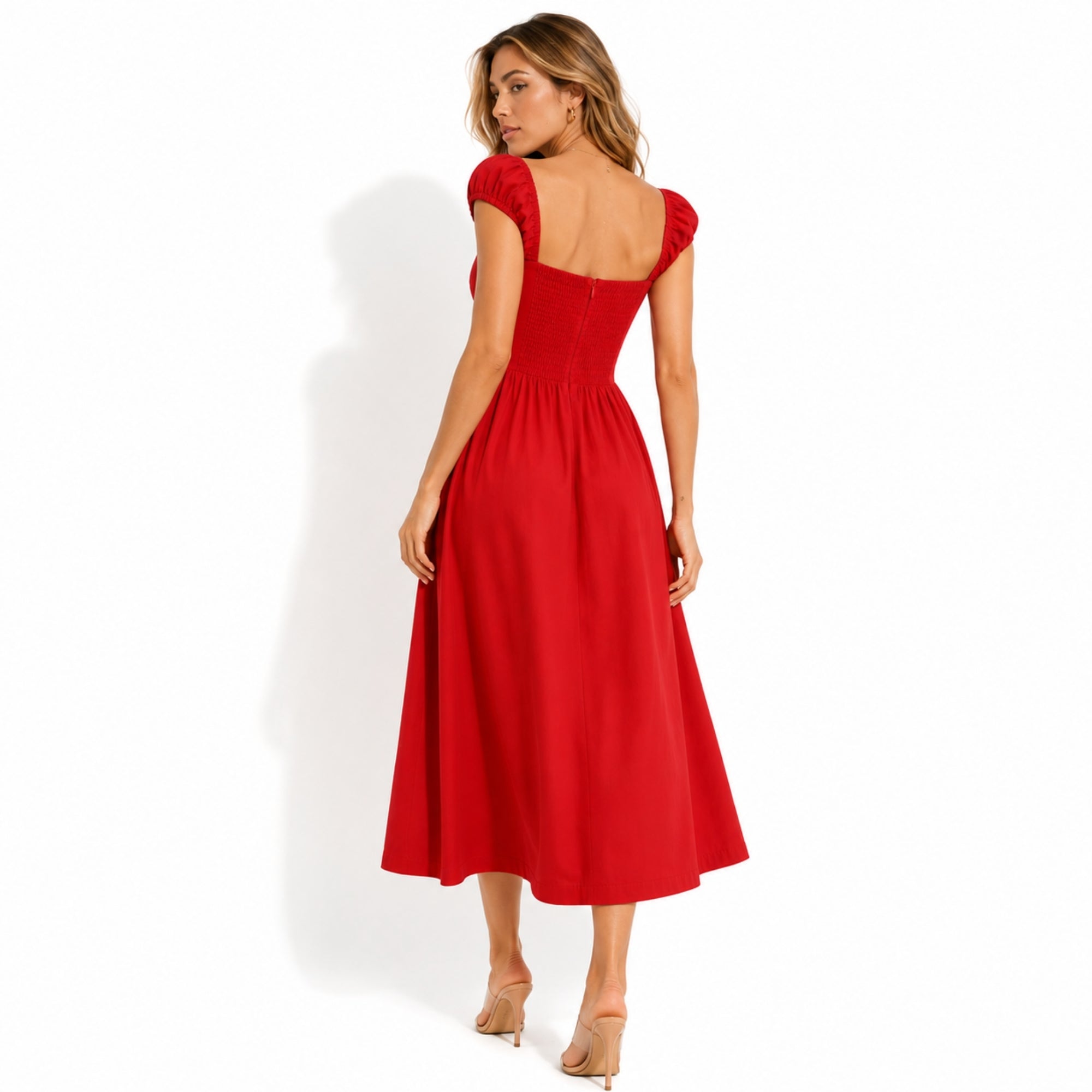 Back view of red corset summer dress showing tailored waistline and smocked back design