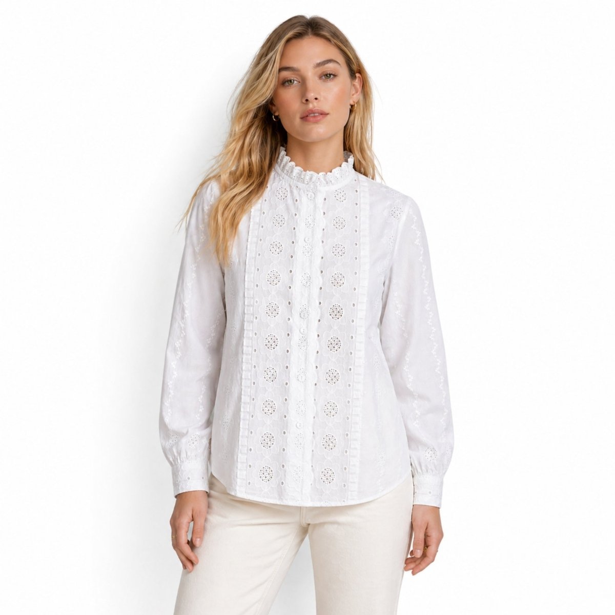 Front view of woman wearing Kouvr white broderie anglaise high neck blouse with long sleeves