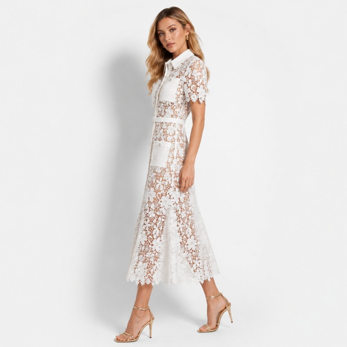 Side profile view of a white short sleeve lace midi dress with nude underlay and collared neckline, beautifully styled with gold strappy heels.