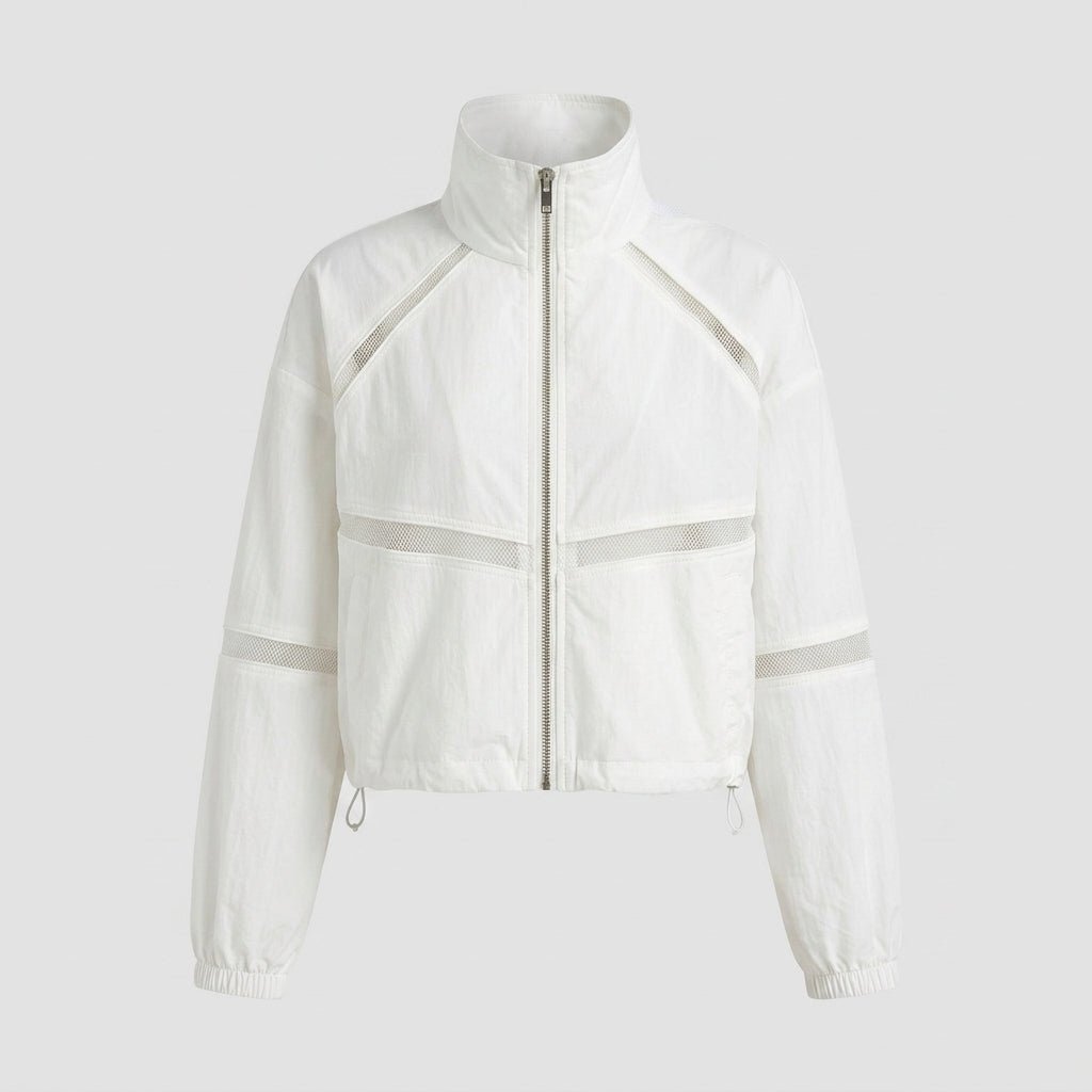 Flat product shot of the white funnel neck track jacket featuring a zip front and geometric mesh inserts