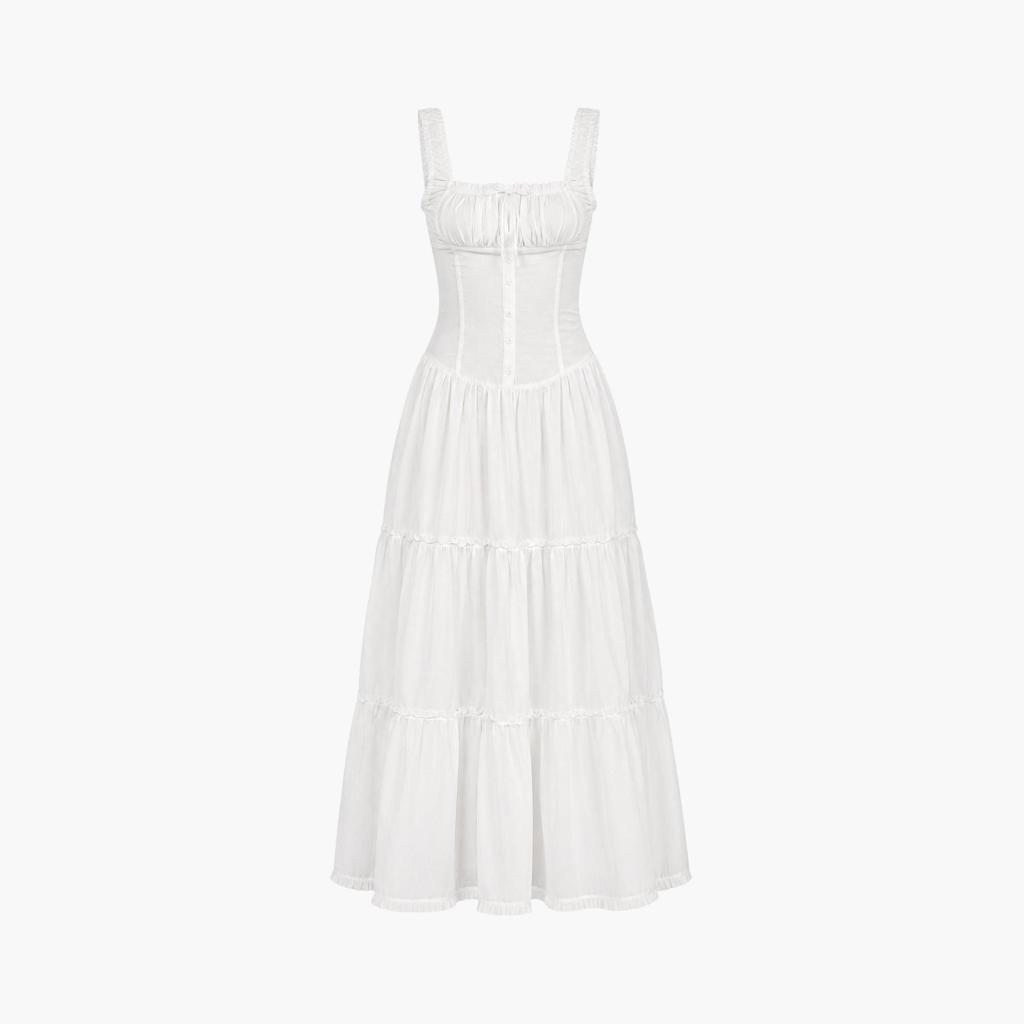 Flat lay front view of a white resort wear dress featuring a square neckline, ruched bust with tie, and button down corset bodice.