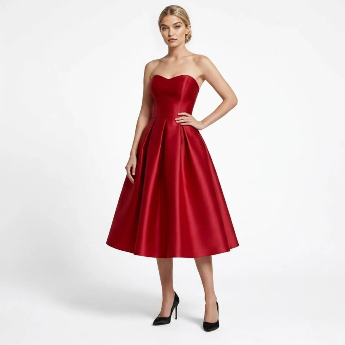 Blonde woman wearing Kouvr elegant wine red strapless sweetheart satin pleated midi dress for cocktail party front view