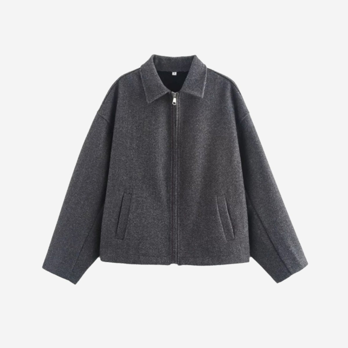 Flat lay of the front of a dark grey brushed wool zip up jacket showcasing the pointed collar and slanted pockets.